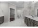 Well-lit bathroom features double vanity sinks and a walk-in closet with custom shelving at 96 Linda Lou Ln, Angier, NC 27501
