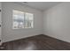 Bright bedroom with hardwood floors and a window offering ample natural light at 96 Linda Lou Ln, Angier, NC 27501