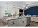 Open concept kitchen with granite countertops, stainless steel appliances, and a breakfast bar at 96 Linda Lou Ln, Angier, NC 27501
