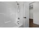 Modern bathroom with a clean shower featuring white tiles and modern fixtures at 96 Linda Lou Ln, Angier, NC 27501