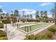 Well-maintained bocce ball court with seating and mature landscaping at 1008 Sounding Ln, Durham, NC 27703