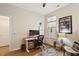 Bright home office with a window for natural light and hardwood floors at 1008 Sounding Ln, Durham, NC 27703