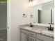 Bathroom featuring double sinks and a vanity at 1036 Smoke Willow Way, Rolesville, NC 27571