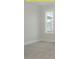 Bright bedroom with a large window that lets in plenty of natural light at 1036 Smoke Willow Way, Rolesville, NC 27571