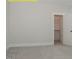 Bedroom with an open closet featuring shelving at 1036 Smoke Willow Way, Rolesville, NC 27571