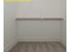 Interior of a closet with carpet flooring at 1036 Smoke Willow Way, Rolesville, NC 27571