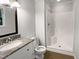 Clean bathroom with a shower and granite vanity at 1104 Theresa Ct, Raleigh, NC 27615