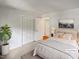 Relaxing bedroom with natural light, a queen-size bed, and ample closet space at 1104 Theresa Ct, Raleigh, NC 27615