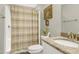 Well-kept bathroom featuring a granite countertop, neutral-colored walls, and a bathtub with a shower curtain at 115 Thornwhistle Pl, Garner, NC 27529