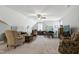Spacious bonus room featuring vaulted ceilings, a ceiling fan, and plenty of seating at 115 Thornwhistle Pl, Garner, NC 27529
