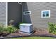 Exterior view showcasing a home backup generator at 115 Thornwhistle Pl, Garner, NC 27529