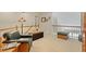 Cozy loft area with comfortable seating, a decorative trunk, and neutral carpeting at 12212 Ashton Woods Ln, Raleigh, NC 27614