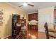 A home office featuring wood floors, plenty of desk space and natural lighting at 12212 Ashton Woods Ln, Raleigh, NC 27614