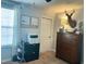 Bedroom with decoratively mounted deer head and black dresser at 123 Claystone Dr, Gibsonville, NC 27249