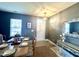 Elegant dining room featuring a dining table set for a meal with contemporary decor at 123 Claystone Dr, Gibsonville, NC 27249