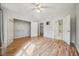 Spacious main bedroom showcasing ample closet space and wood-look floors at 1301 Durlain Dr # 103, Raleigh, NC 27614