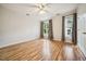 Bright bedroom with wood-look flooring, and natural light at 1301 Durlain Dr # 103, Raleigh, NC 27614