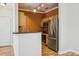 Modern kitchen featuring stainless steel appliances and dark countertops at 1301 Durlain Dr # 103, Raleigh, NC 27614