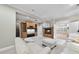 Cozy living room featuring a fireplace, built-in shelving, and comfortable seating arrangement at 1308 Woodgate Manor Ct, Raleigh, NC 27614
