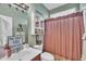 Bathroom features updated vanity and shower with decorative accents and fixtures at 133 Marino Pl, Clayton, NC 27527