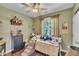 Whimsical bedroom features a cozy bed, light fan, and charming decor at 133 Marino Pl, Clayton, NC 27527