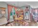 Cozy dining area featuring wood table, windows, and unique Coca-cola themed decorations at 133 Marino Pl, Clayton, NC 27527