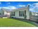 Well-kept home features neat landscaping and cozy porch area at 133 Marino Pl, Clayton, NC 27527