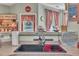 Close-up on the kitchen sink area with vintage Coca-cola themed decorations and natural lighting at 133 Marino Pl, Clayton, NC 27527