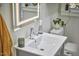 Modern bathroom featuring a light vanity and chrome faucet at 1408 Ida St, Durham, NC 27705