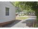 View of home exterior, landscaping, and street at 1408 Ida St, Durham, NC 27705