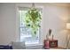 Bright living room with hanging houseplant and neutral decor at 1408 Ida St, Durham, NC 27705