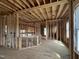 Framed living room showing an open layout, natural light, and potential for a great living space at 151 Retreat Run, Smithfield, NC 27577