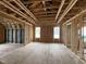 Spacious, framed living room with high ceilings and ample natural light, ready for customization at 151 Retreat Run, Smithfield, NC 27577
