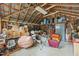Spacious garage/storage shed featuring exposed rafters and ample room for storage and hobbies at 1541 Shadylawn Dr, Burlington, NC 27215