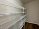 Spacious walk-in closet with ample shelving for optimal organization at 180 Tulipfield Way, Benson, NC 27504
