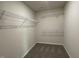 Spacious walk-in closet featuring modern shelving for optimal storage and organization at 180 Tulipfield Way, Benson, NC 27504
