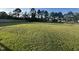 Expansive fenced backyard, offering ample space for outdoor activities and serene enjoyment at 195 Washington Ln, Cameron, NC 28326