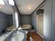 Well-lit bathroom with double sink vanity, garden tub, and a separate shower stall at 195 Washington Ln, Cameron, NC 28326