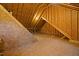Exposed beams and plywood flooring in this unfinished attic space at 200 Daniel Ridge Ln, Roxboro, NC 27574