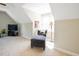 Attic bonus room with a chaise lounge chair and large windows for natural light at 200 Daniel Ridge Ln, Roxboro, NC 27574