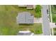 Aerial view of a home, showing the roof, backyard with patio set, and surrounding neighborhood at 2004 Tennessee Rd, Durham, NC 27704