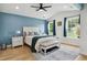 Inviting main bedroom with a plush bed, ample natural light, and stylish decor at 2004 Tennessee Rd, Durham, NC 27704