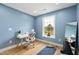 Home office features a modern desk, natural light from the window, and exercise mat at 2004 Tennessee Rd, Durham, NC 27704