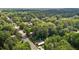 Overhead view of the home surrounded by lush greenery in a suburban setting at 203 W Boundary St, Cary, NC 27513