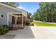 A covered porch area boasts brick trim and a black metal railing, enhancing the home's curb appeal at 203 W Boundary St, Cary, NC 27513