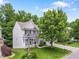 Beautiful aerial view of a home with lush green landscaping and a well-manicured lawn at 205 Slate Blue Pl, Cary, NC 27519