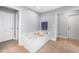 Relaxing bathroom featuring a soaking tub and classic tile flooring at 205 Slate Blue Pl, Cary, NC 27519