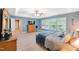 Bright main bedroom with a ceiling fan and large windows offering great views at 205 Slate Blue Pl, Cary, NC 27519