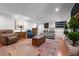 Cozy living room with plush seating, built-in shelving, and a warm inviting atmosphere at 2053 Nottingham Ln, Burlington, NC 27215