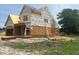 New construction home, framed with brick detailing, shows a home in the process of being built at 209 Atkins Rd, Cameron, NC 28326